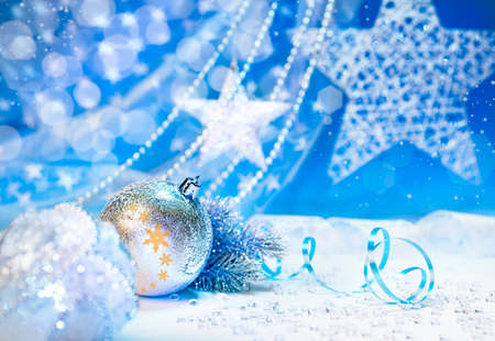 Xmas decorations on blue winter backgroundの写真素材