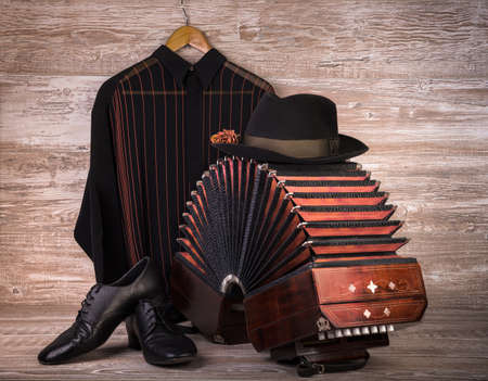 Argentine tango, still life composition with bandoneon on wooden の写真素材