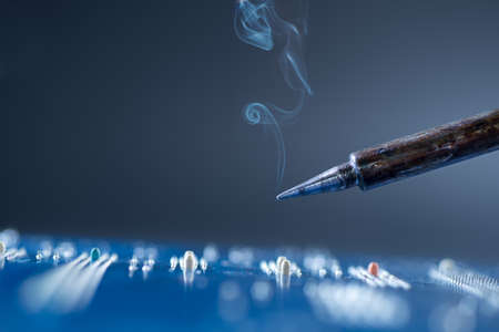 Soldering, shallow DOF, focus on the tip, text spaceの写真素材