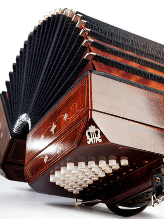 Close-up on bandoneon, tango instrument, on white backgroundの写真素材