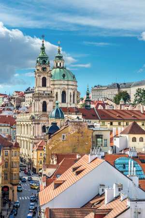 St  Nicolas church, St  Vitus Cathedral and and roofs of Prague, an aerial viewのeditorial素材