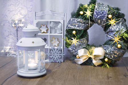 Decorative lantern, candles and Christmas decorationsの写真素材