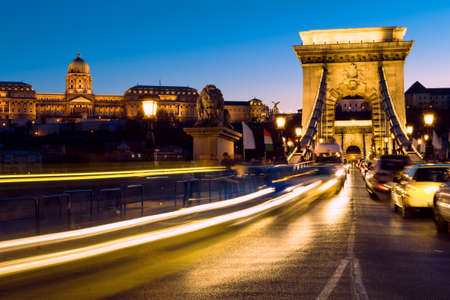 Evening traffic on Suspension Bridge in Budapest Hungary toned imageの写真素材