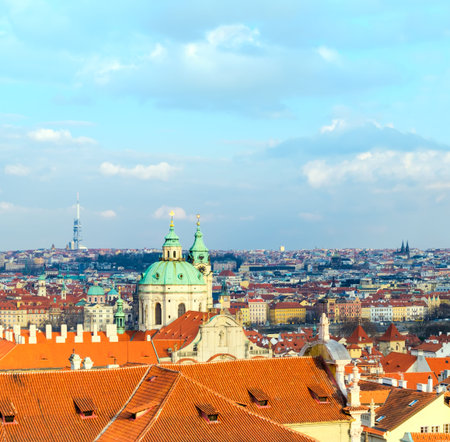 St. Nicolas church and and roofs of Prague on a bright dayのeditorial素材