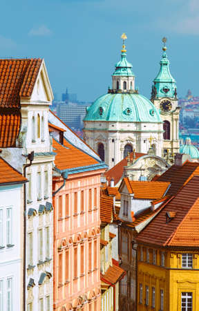 St. Nicolas church and and roofs of Prague on a bright dayのeditorial素材