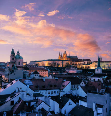 Roofs of Prague and St. Vitus Cathedral in the evening. This image is toned.の写真素材