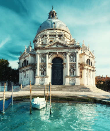 Grand Canal and Basilica Santa Maria della Salute in Venice on a bright day. This image is toned.の写真素材