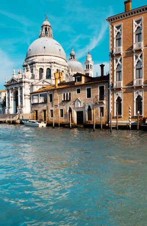 Grand Canal and Basilica Santa Maria della Salute in Venice on a bright day. This image is toned.の写真素材