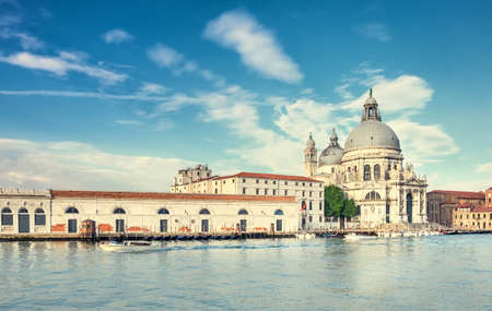 Grand Canal and Basilica Santa Maria della Salute in Venice on a bright day. This image is toned.のeditorial素材