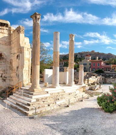 Remains of Hadrian's Library, Plaka and Acropolis late afternoon, Athens, Greeceの写真素材