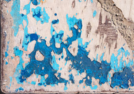 Grunge texture, several layers of paint peeling from wooden boards of a boat hullの写真素材