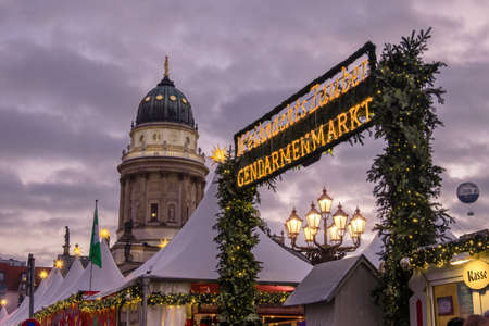BERLIN, GERMANY - DECEMBER 29, 2016: Chtristmas market in Gandarmenmarkt in Berlin on a sunset. This famos market is open till Silvester, or Christmas Eve.のeditorial素材