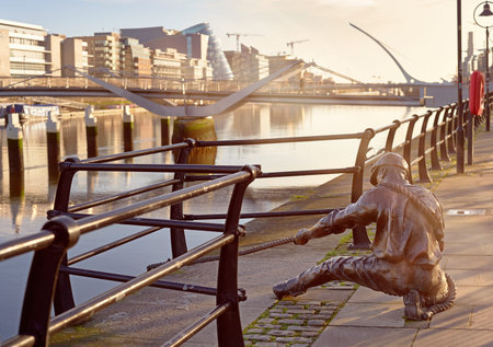 The Linesman statue at Liffey river in Dublin, Ireland, panoramic image