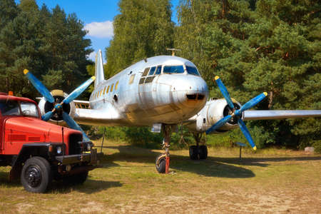 FINOWFURT, GERMANY - AUGUST 22, 2015:  IL 14, an old Russian military propeller airplaine on an old airfield. Finowfurt Aviation Museum (Luftfahrtmuseum Finowfurt) in Brandenburg, Germany.のeditorial素材