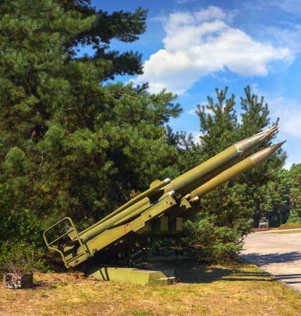 FINOWFURT, GERMANY - AUGUST 22, 2015: Old Soviet ground to air missiles, panoramic image made at old Soviet airfield base at Finow, Brandenburg, former DDR, currently Finowfurt Aviation Museum.のeditorial素材