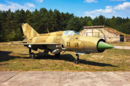 FINOWFURT, GERMANY - AUGUST 22, 2015:  mig 17, an old Russian airplaine on an old airfield. Finowfurt Aviation Museum (Luftfahrtmuseum Finowfurt) in Brandenburg, Germany.のeditorial素材