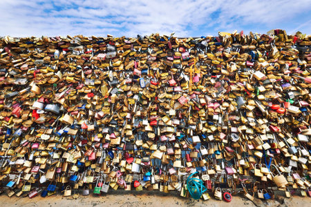 PARIS, FRANCE - MAY 15, 2017: Love Padlocks on Pont Neuf over the Seine River, Paris, France.The...