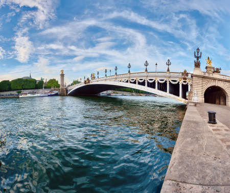 Alexandre III Bridge in Paris on a bright day in Spring, panoramic imageの写真素材