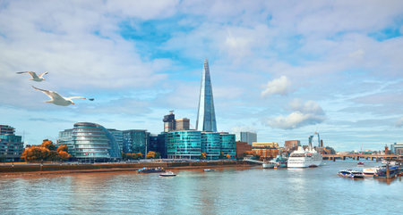 London, South Bank Of The Thames on a bright day. Panoramic image taken from the Tower bridge.の写真素材