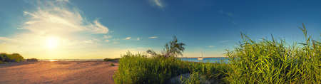 Panoramic image of a sea wall by the mouth of Swina river in Swinoujscie, a port in Poland on the Baltic Sea. This image is filtered.の写真素材
