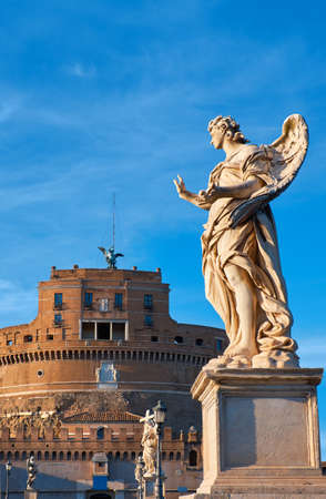 Statue of an angel on Sant Angelo Bridge in Rome, Italy. The bridge is leading to Castle Sant Angelo via river Tiber.のeditorial素材