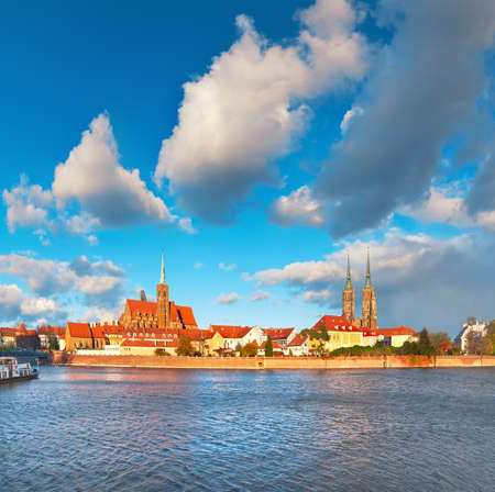 Wroclaw, panoramic image of Cathedral of St. John under dramatic sky in Fall.の写真素材