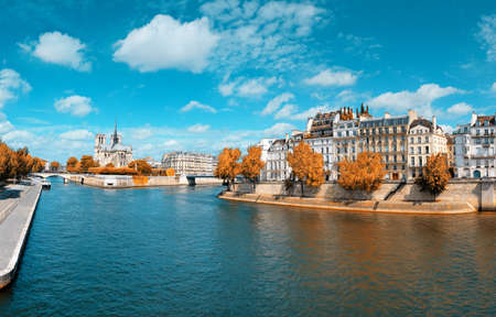 Paris, river Seine with Notre-Dame cathedral from the back on a bright day in Autumnの写真素材