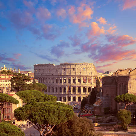 Construction work by Colosseum in Rome, Italy, on a sunset, panoramic image.の写真素材