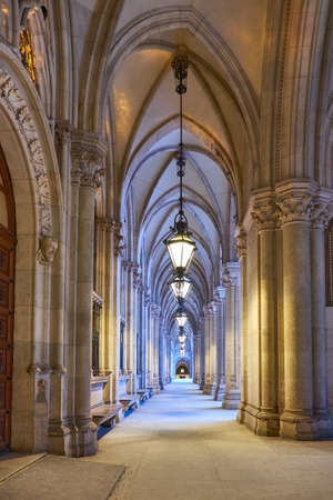 Arched passage in front of the City Hall (Rathaus) in Vienna, Austria, early in the eveningのeditorial素材