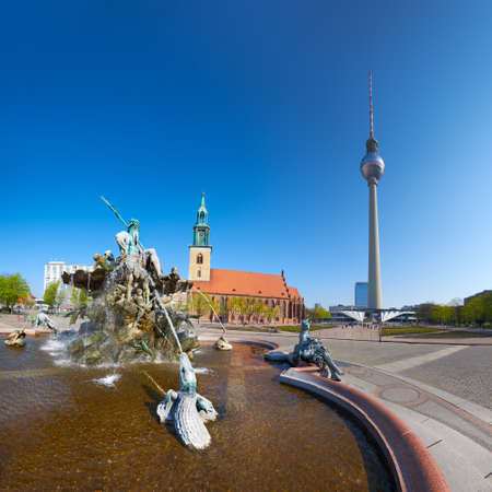 View of Alexanderplatz, Neptune fountain and the TV Tower in Berlin, Germany. Square composition, panoramic image.のeditorial素材