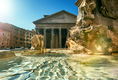 Fountain on Piazza della Rotonda with Parthenon behind on a bright morning in Rome, Italyのeditorial素材