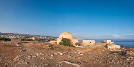 Medieval fortress buildings early in Rethymno city, Crete. Panoramic image taken early in the morning.の写真素材