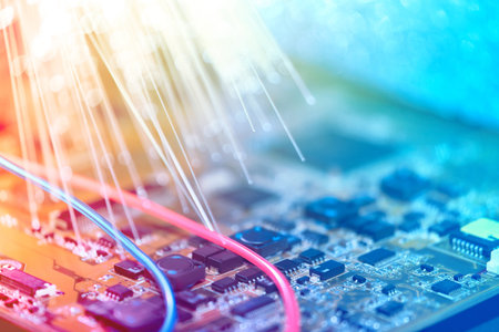 Closeup on electronic board and neon electric lights, blurred and toned electronic background in...