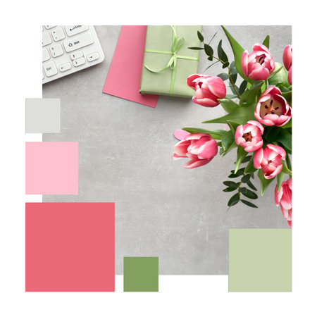 Trendy color matching complementary palette from Springtime workspace, flat lay with pink tulips, eucalyptus, keyboard, cards and gift box on grey stone tableの写真素材