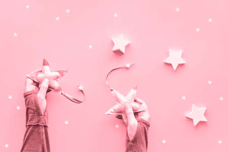 Creative pink monochrome Christmas flat lay on paperの写真素材