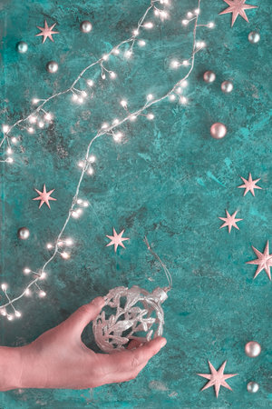 Christmas or New Year flat lay background on dark tile textured board. Top view flat lay on Xmas...