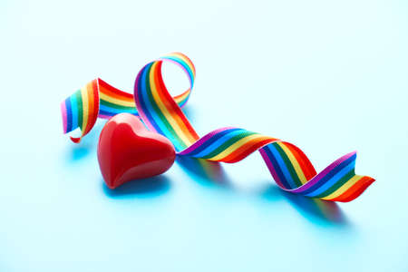 Heart, rainbow ribbon, symbols of public support for doctors, nurses, medical stuff fight novel coronavirus disease, Covid-19 pneumonia across the globe worldwide.の写真素材