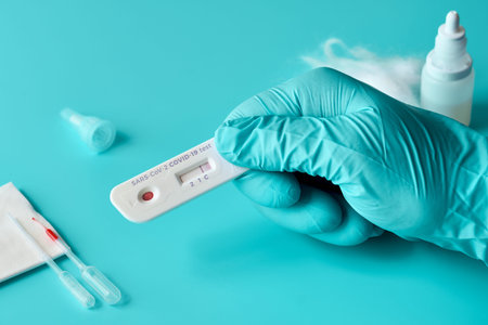Express COVID-19 test for IgM and IgG antibodies to novel coronavirus SARS-CoV-2, Covid-19. Nurse or...