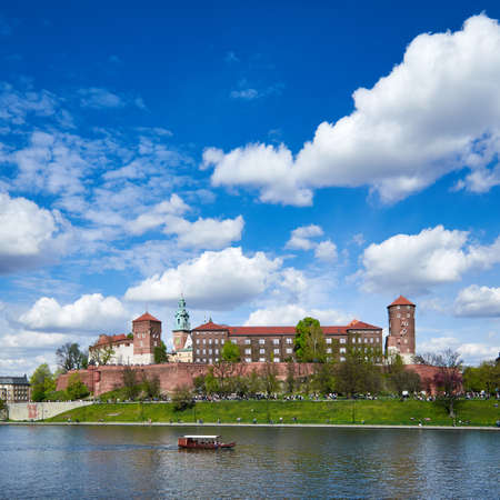 Springtime view of Vistula river with Wawel Royal Castle in the background on sunny day in Spring, historic part of Krakow city in Poland, panoramic square imageのeditorial素材