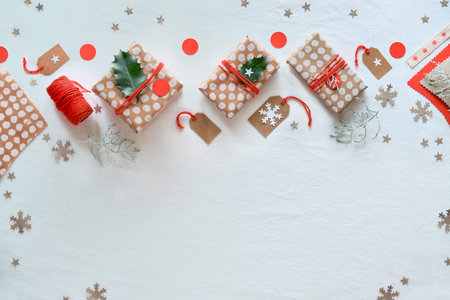 DIY Christmas gifts and handmade decorations, copy-space. Eco-friendly Xmas celebration. Gift boxes...