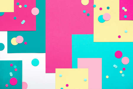 Greeting card with circle round particles and flowers in small envelope. Concept geometric flat lay, top view on layered paper background. Striking colors, creative thank you designの写真素材