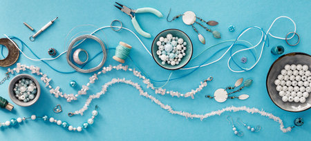 Creative flat lay, panoramic composition. DIY craft hobby. Making handmade jewelry for friends as...