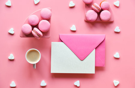 Happy Birthday or St. Valentines day Sweet and tasty macaroons, coffee. Monochrome flat lay on pink...
