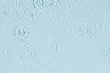 Water background. Blue water texture, blue mint water surface with rings and ripple. Spa concept...