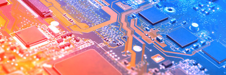 Closeup on electronic board in hardware repair shop, blurred and toned image. Shallow DOF, focus on...