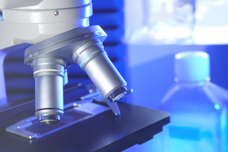 Microscope in research laboratory. Scientific, medical, education background. Biological or...