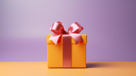 A yellow gift box with a pink bow. Generative AI image.の素材