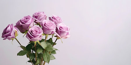 A vase filled with purple roses sitting on a table. Generative AI image.の素材