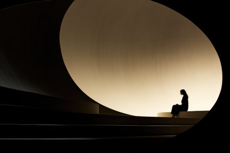 A person sitting on a set of stairs. Digital image.の素材