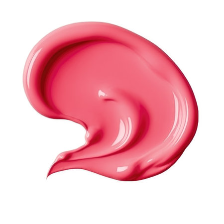 A close up of a pink liquid on a white surfaceの素材